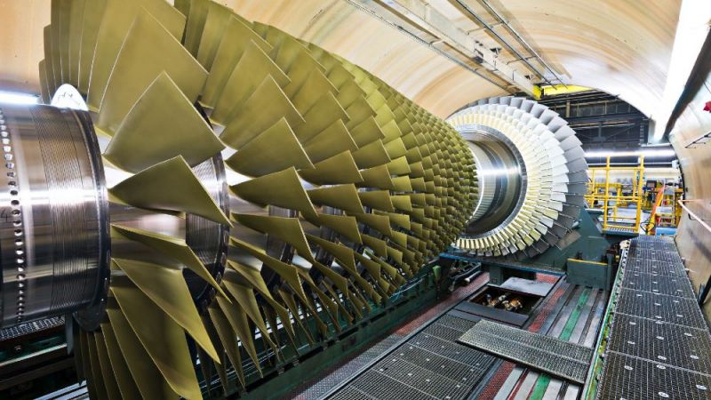 The photo shows a gas turbine in a high-speed balancing plant.