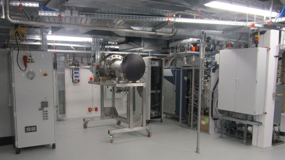 The TPDE laboratory room with micro gas turbine bays and a micro gas turbine combustor test stand under construction.