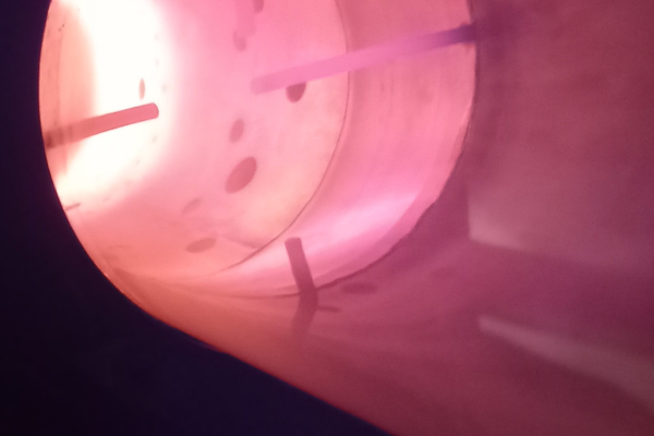 In the picture you can see  the flame tube during hydrogen combustion at the TU Berlin test stand.