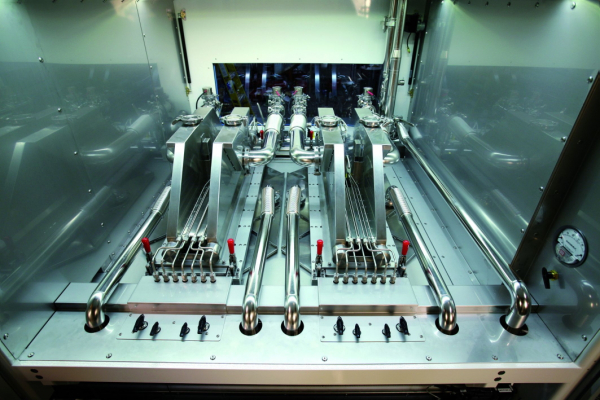The APCVD system comprises several injector heads that are connected in series for the deposition process.